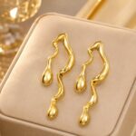 Ethnic & Western Wear Designer Glossy Gold-Plated Unique Wave Earrings