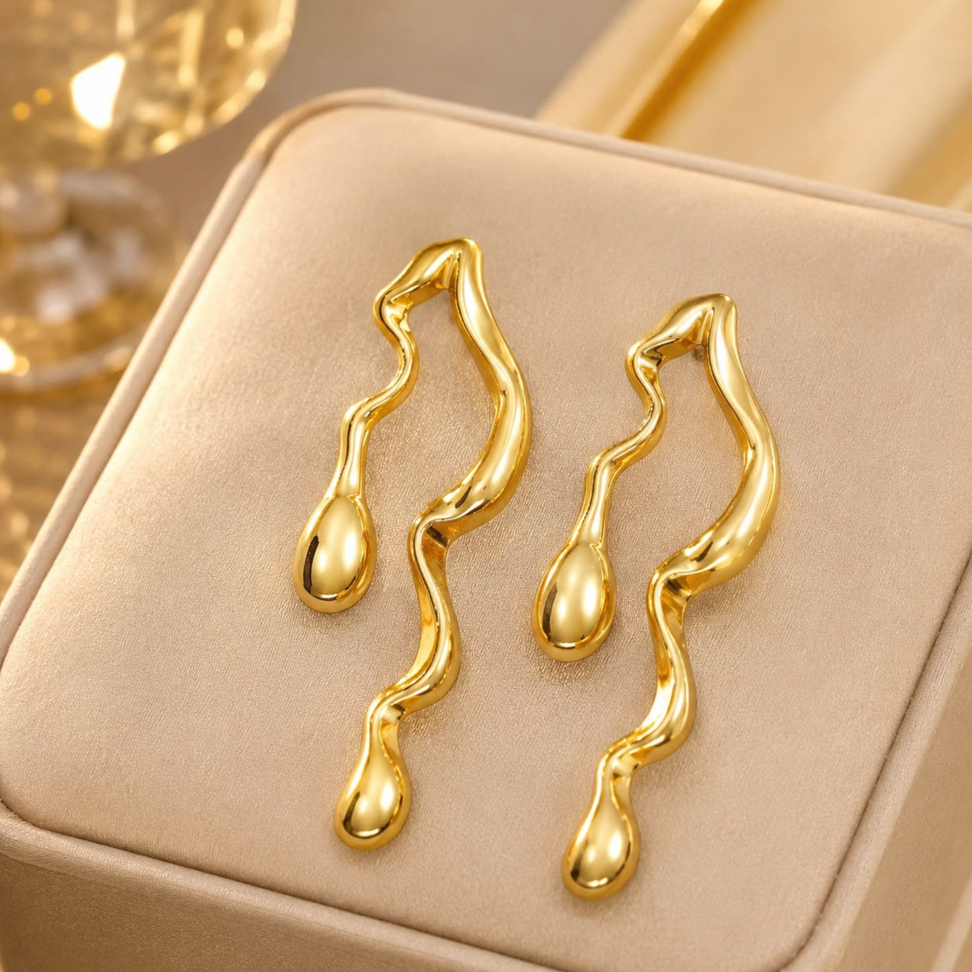 Ethnic & Western Wear Designer Glossy Gold-Plated Unique Wave Earrings